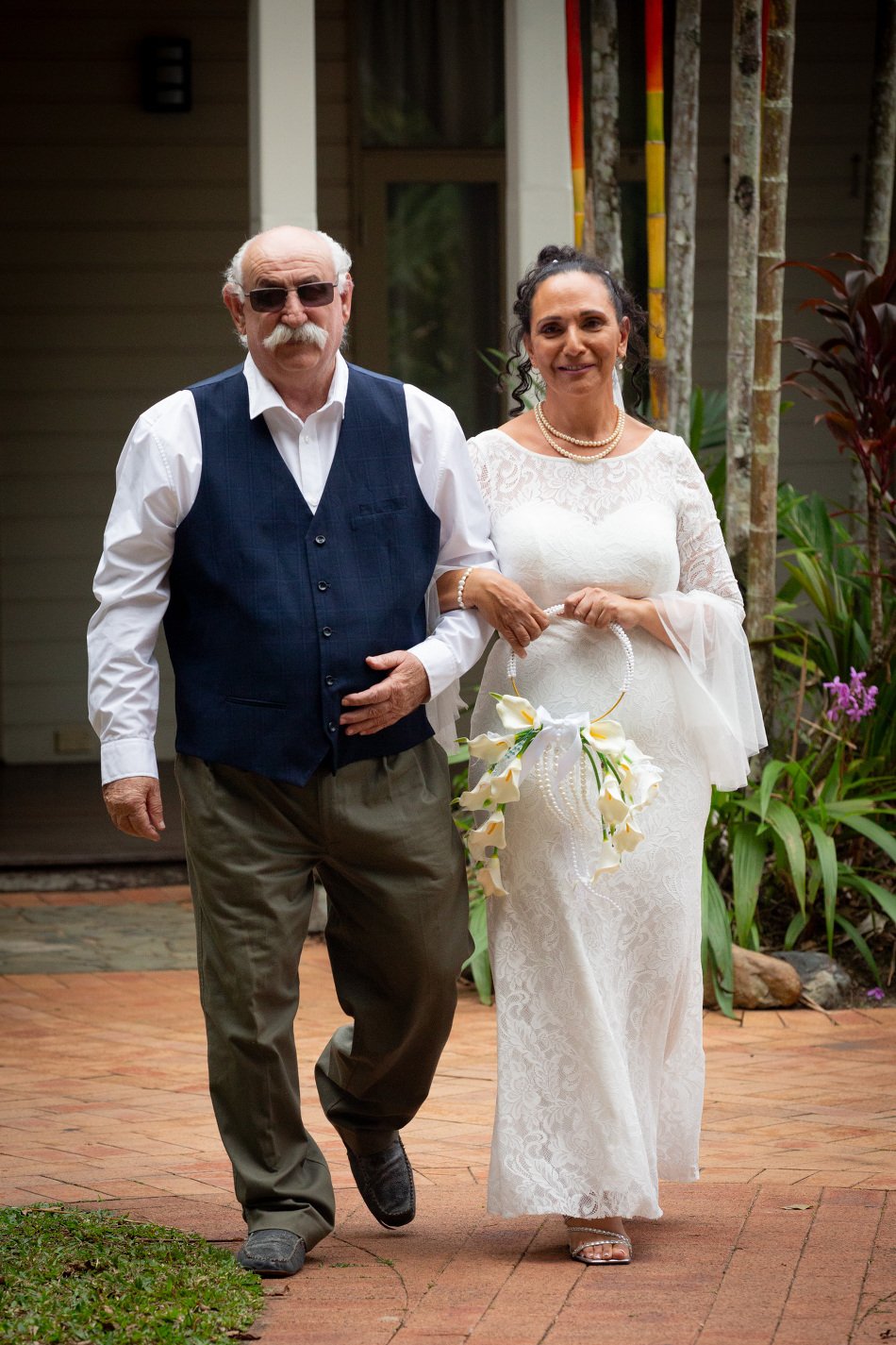 Bride and groom portraits at Cairns Colonial Club wedding photographed by Cairns wedding photographer Nathan Kelly